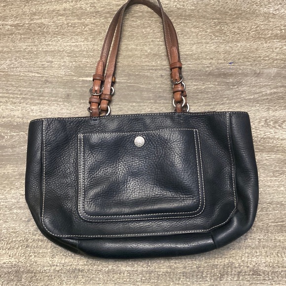 Coach
Chelsea Pebbled  Black and Brown Leather Shoulder Bag
15"L x 4"W x 8"H - Picture 3 of 16